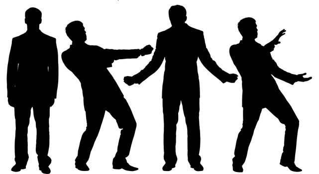 Black silhouettes of businessman standing in different postures, face and profile views