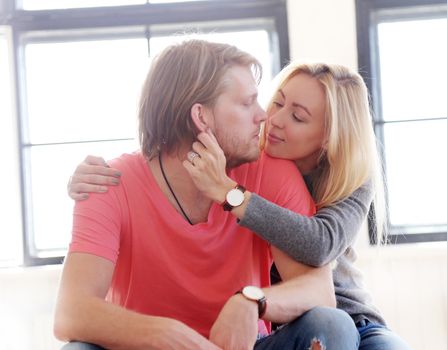 Love, relationship. Beautiful couple at home