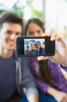 Young students taking a selfie at the university