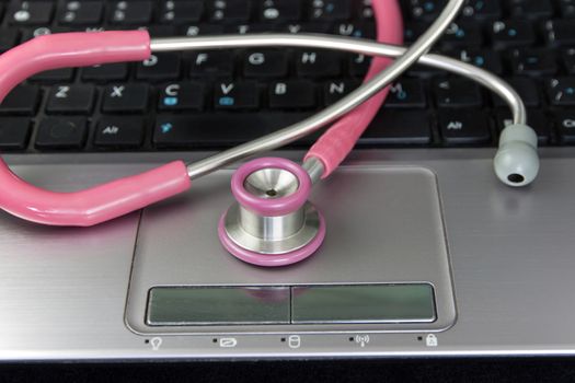 Stethoscope and Laptop.Maintaining computer concepts and idea.