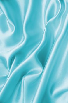 Smooth elegant blue silk or satin can use as background 