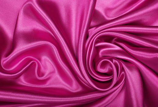 Smooth elegant pink silk or satin can use as background