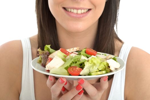 Attractive Healthy Happy Young Woman Holding a Plate of Chicken with Mixed Salad