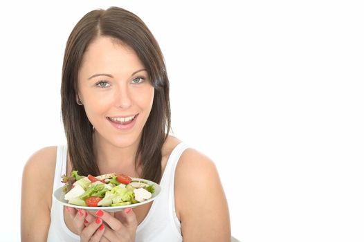 Attractive Healthy Happy Young Woman Holding a Plate of Chicken with Mixed Salad