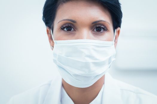 Portrait of female dentist wearing surgical mask