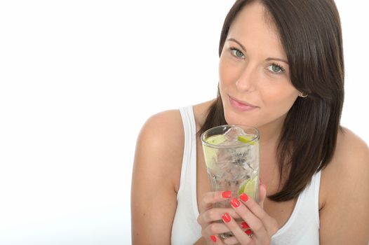 Healthy Young Woman Holding a Glass of Iced Water with Lime