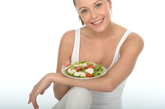 Healthy Young Woman Holding a Plate of Chicken Salad