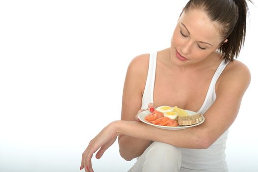 Healthy Happy Attractive Young Woman Holding a Typical Norwegian or Scandinavian Breakfast