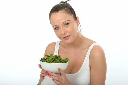 Healthy Happy Attractive Young Woman Holding a Bowl of Spinach