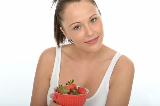 Healthy Fit Attractive Young Woman Holding a Bowl of Fresh Ripe Juicy Strawberries