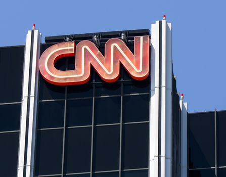 HOLLYWOOD, CA/USA - APRIL 18, 2015: CNN building exterior and logo. Cable News Network (CNN) is an American basic cable and satellite television channel that is owned by Time Warner.