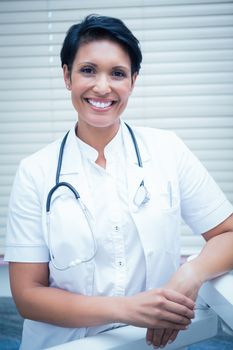 Portrait of confident smiling female dentist