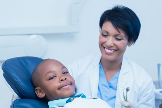 Portrait of smiling boy waiting for a dental exam 