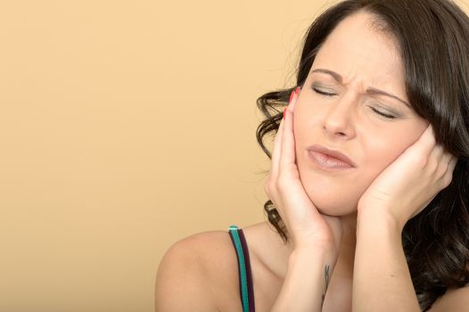 Attractive Young Woman Suffering With a Painful Toothache