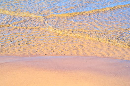 Soft wave on the sandy beach