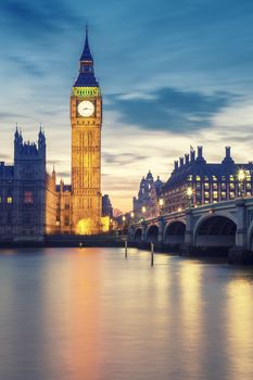 Big Ben tower in London at sunset, UK.