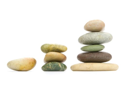 Color sea stones (the different form) on a white background.