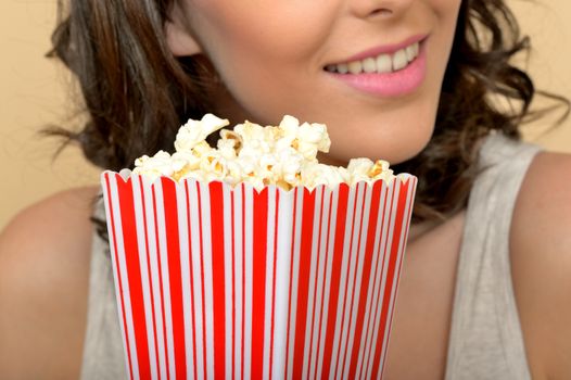 Attractive Beautiful Young Woman Eating Popcorn