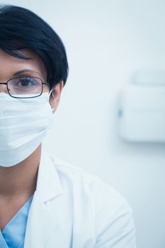 Portrait of female dentist wearing surgical mask
