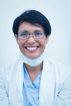 Close up portrait of smiling young female dentist