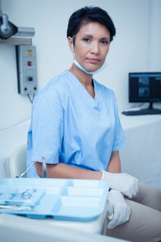 Portrait of confident young female dentist