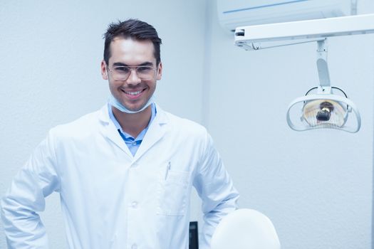 Portrait of smiling young male dentist