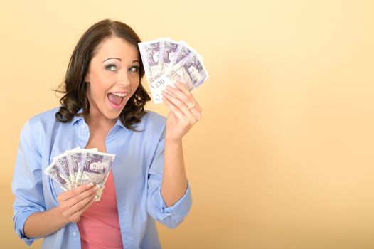 Attractive Young Happy Woman Holding Money Looking Pleased and Delighted Sitting on The Floor