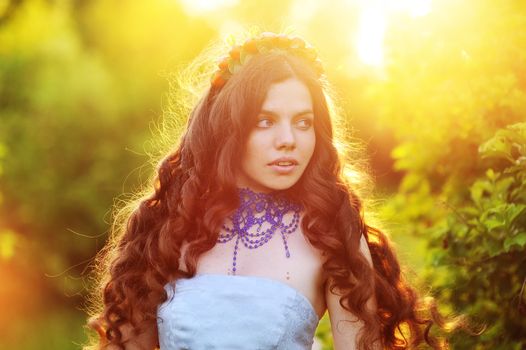 portrait of beautiful girl on nature background