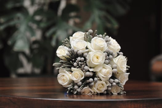 bridal bouquet of white roses.