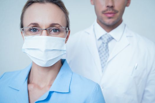 Close up portrait of male and female dentists