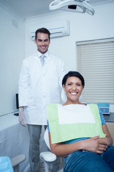 Portrait of smiling young woman waiting for a dental exam