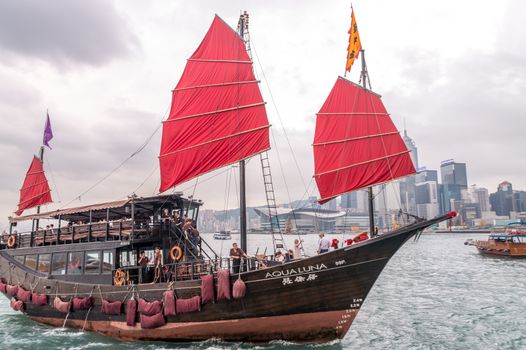 HONG KONG - APRIL 14, 2014: Famous Aqua Luna boat in Hong Kong Port. It is owned by the Aqua Restaurant Group, and was launched in 2006.