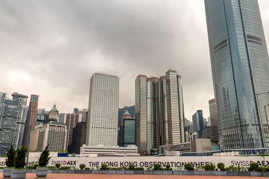 HONG KONG - APRIL 15, 2014: Hong Kong skyline on a spring day. Hong Kong is visited by more tha 20 million people annually.