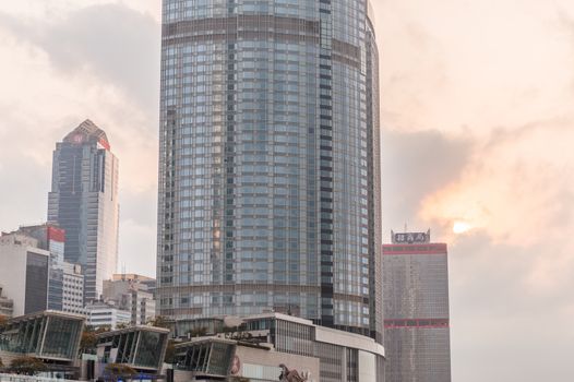 HONG KONG - APRIL 15, 2014: Hong Kong skyline on a spring day. Hong Kong is visited by more tha 20 million people annually.