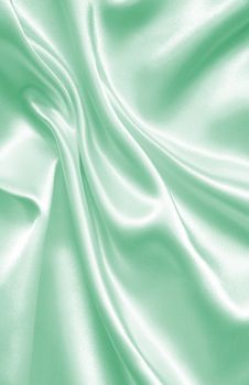 Smooth elegant green silk or satin can use as background