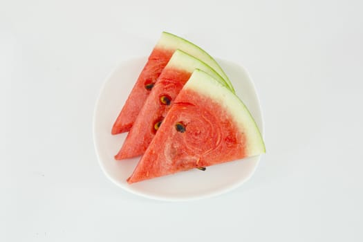 Slice of watermelon on white background