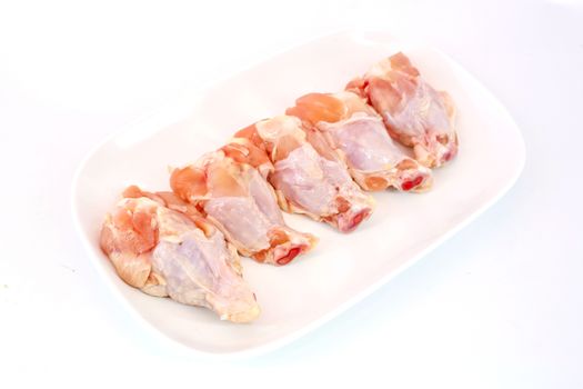 Fresh raw chicken wings isolate on white background ready to be grilled
