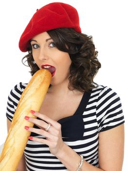 Attractive Happy Young Woman Eating a French Stick Bread Loaf