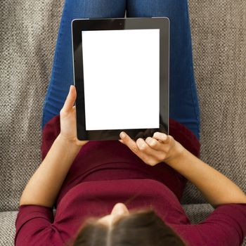 Cropped shot of female hands working with a tablet, tablet with copy space 