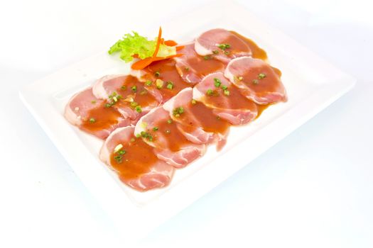 freshness slided pork on white dish for grill