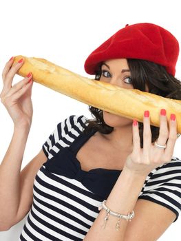 Attractive Happy Young Woman Eating a French Stick Bread Loaf