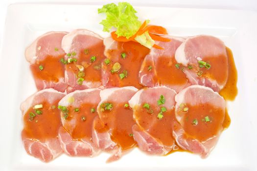 freshness slided pork on white dish for grill