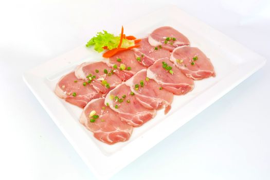 freshness slided pork on white dish for grill