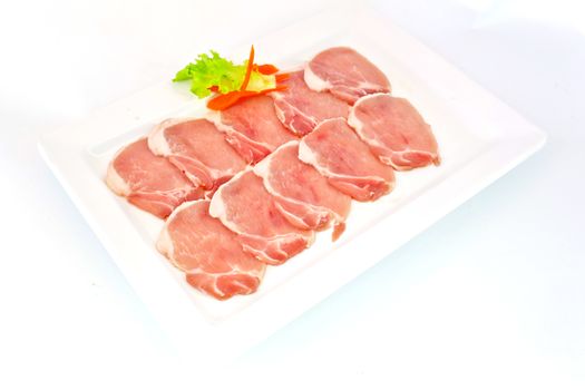 freshness slided pork on white dish for grill