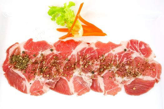 freshness slided pork on white dish for grill
