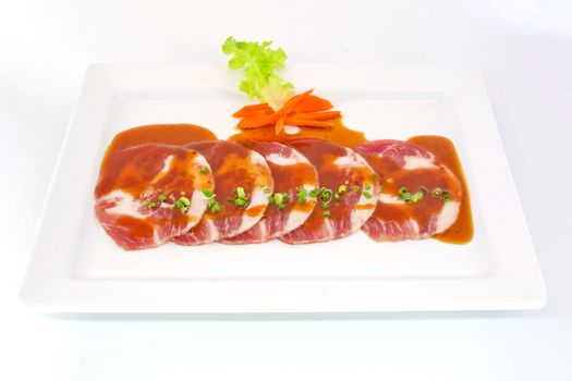 freshness slided pork on white dish for grill
