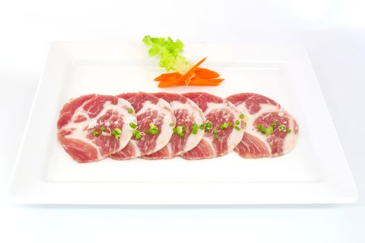 freshness slided pork on white dish for grill