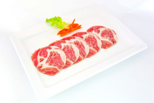 freshness slided pork on white dish for grill