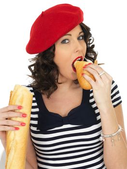 Attractive Happy Young Woman Eating a French Stick Bread Loaf