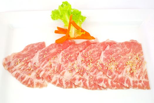High grade sliced Hida wagyu beef isolated on white background